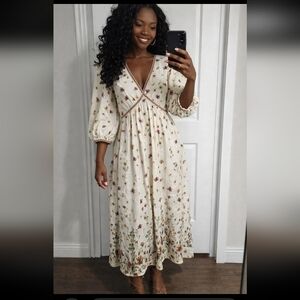 Max Studio Cream Floral Dress Puff Sleeve Plunge Neck And Has Side Pockets.
